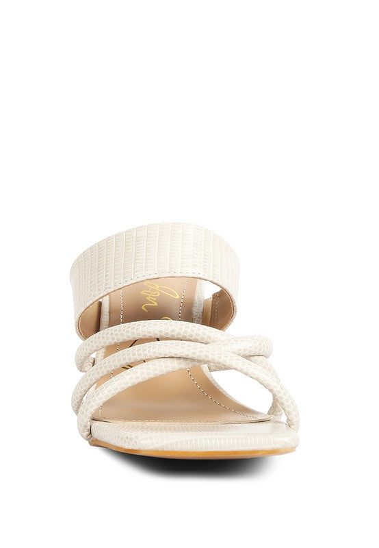 CHIRI Criss Cross Spool Heel Sandals